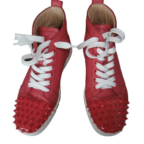 red louboutin sneakers